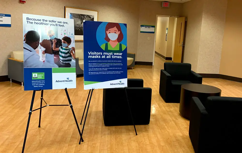 A physician's suite at AdventHealth Palm Coast on Thursday. No such signs will be posted in Flagler schools as they prepare to reopen for a full complement of students on Aug. 10. (© FlaglerLive)