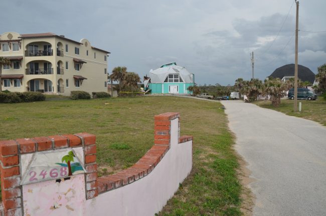 The two dome houses have been at 2468 and 2474 North Oceanshore Boulevard since the early 1980s. Click on the image for larger view. (© FlaglerLive) have