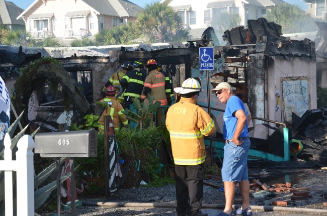 Flagler County Fire Chief Don petito and Flagler Beach City Manager Bruce Campbell at the scene. Click on the image for larger view. (© FlaglerLive)