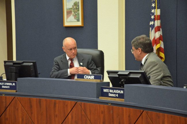 Flagler County Commissioner Donald O'Brien, left, got fellow-Commissioner Nate McLaughlin flustered when O'Brien proposed a different way of applying new revenue from a proposed increase in the county's tourism tax. (© FlaglerLive)