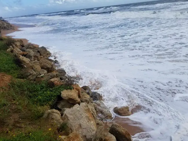 Hurricane Dorian's early message to Flagler Beach was lapping at the rock revetment the Department of Transportation put down after Hurricane Matthew in 2016. Dorian's storm surge and waves are expected to cause some impact to the shoreline. (c Charles Knirk for FlaglerLive)