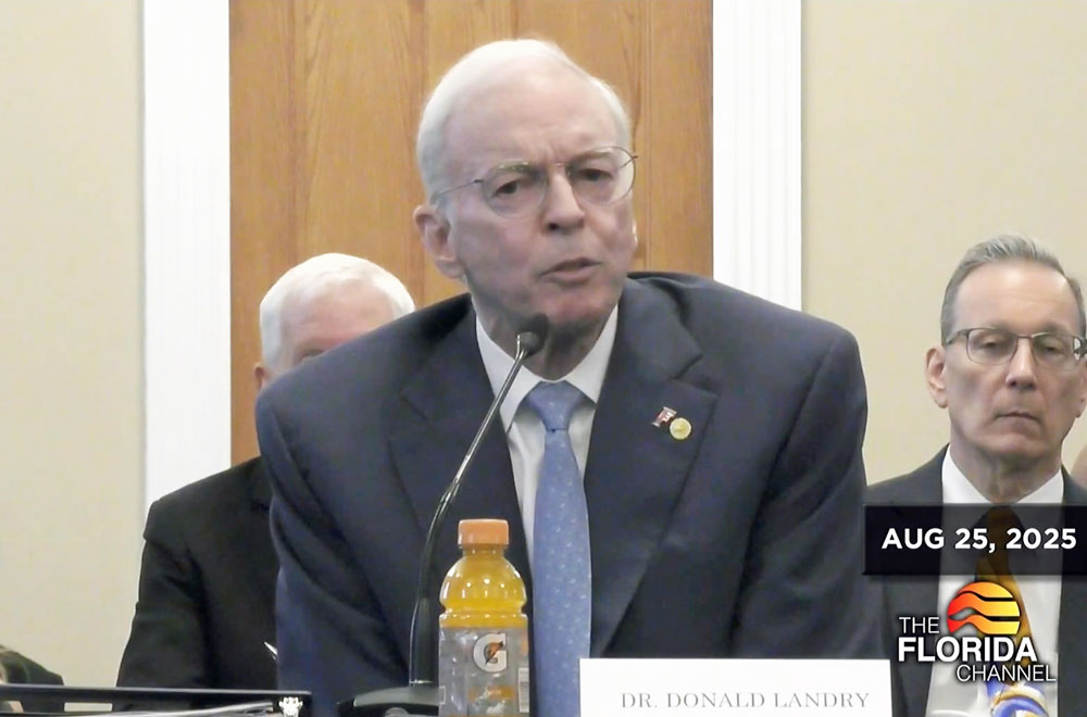 Donald Landry in his appearance before the University of Florida Board of Trustees. (© FlaglerLive via Florida Channel)