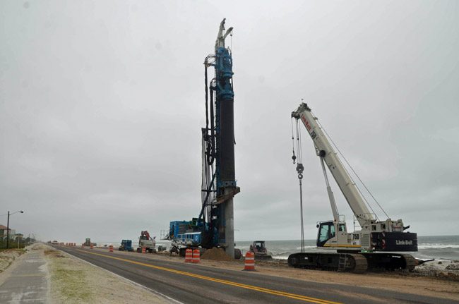 A pillar drill machine has been at work at the north end of Flagler Beach, part of the Florida Department of Transportation's construction of a sea wall. See below. (© FlaglerLive)