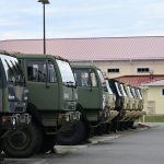 Drivers needed: vehicles at the Palm Coast National Guard facility near the county airport. (© FlaglerLive)