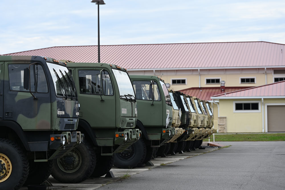 Drivers needed: vehicles at the Palm Coast National Guard facility near the county airport. (© FlaglerLive)