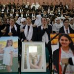 Members of the Druze minority attend a memorial ceremony for the children and teens killed in a rocket strike in the village of Majdal Shams, in the Israeli-annexed Golan Heights.