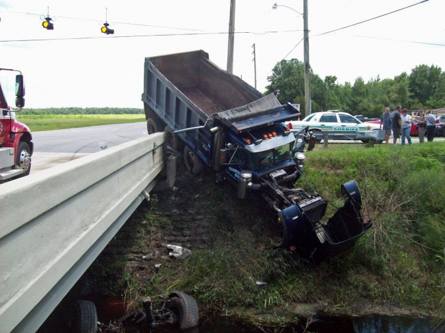 The dump truck, post-swerving. Click on the image for larger view. (© Elbert Tucker for FlaglerLive)