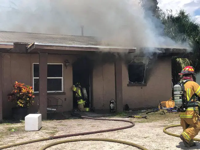 The duplex at 502 East Drain Street as firefighters worked to put it out. (Flagler County Professional Firefighters Local 4337)