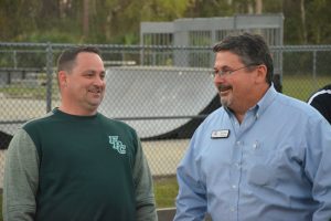 Dusty Sims with School Board member Andy Dance in March, before the pair joined a student-led march in response to the Parkland massacre. (© FlaglerLive)