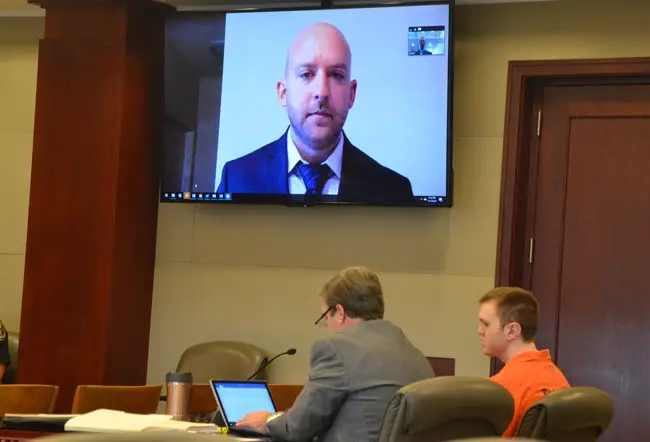 C.J. Whiteside, a former Florida Department of Law Enforcement agent who interviewed Paul Dykes at the Flagler County jail in what turned out to be an illegally conducted interview, testified in court this morning by video conference, during a motion to suppress the evidence gathered as a result of that interview. The judge ruled against the motion. Dykes goes on trial on charges of raping a child on Dec. 4. (© FlaglerLive)
