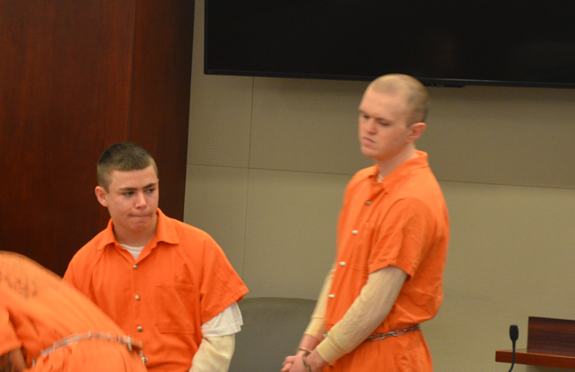 Paul Dykes, right, arriving in court with other inmates this morning in what may be his last appearance in Flagler before his transfer to state prison. (c FlaglerLive)