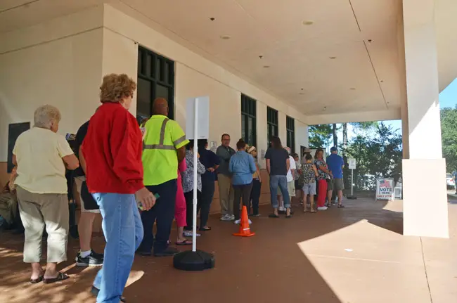 Early voting in Flagler, as at the public library location above, has been brisk through seven days, but if it will break records, it will not shatter them: the pace is only slightly ahead of that of 2008. (© FlaglerLive)