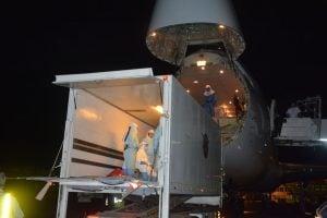 Operation Tranquil Shift loading a containerized biocontainment system outfitted aircraft on April 17, 2017 in Freetown, Sierra Leone