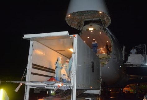 Operation Tranquil Shift loading a containerized biocontainment system outfitted aircraft on April 17, 2017 in Freetown, Sierra Leone