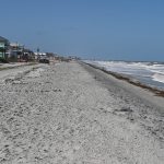 The state established an Erosion Control Line, delineating seaward state property from upland private property, along the more than 3 miles of beaches in Flagler Beach that were rebuilt (or renourished) last year by the U.S. Army Corps of Engineers. That line is permanent, and will define where the beach must be rebuilt, every time it is eroded. A similar line is about to be set north of the Flagler Beach pier. (© FlaglerLive)