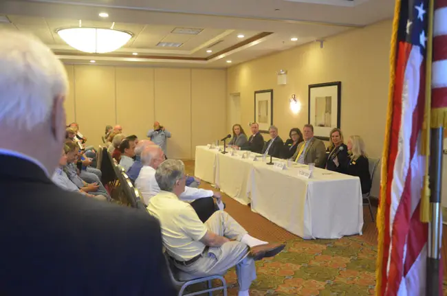 Ed Fuller of the Flagler Palm Coast Forum hosted what may be the only judges' forum of the 2018 election season Tuesday evening at Palm Coast's Hilton Garden Inn. Some 80 to 90 people attended the event, not counting bailiffs. (© FlaglerLive)