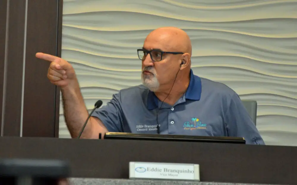 Palm Coast City Council member Eddie Branquinho as he addressed fellow-Councilman Victor Barbosa early this afternoon at a workshop. (© FlaglerLive)