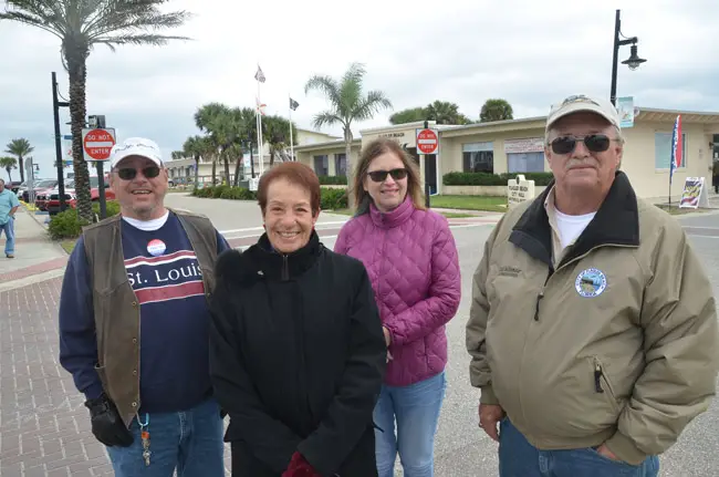 The contestants in Flagler Beach around midday today: from left. Paul Eik, incumbent Jane Mealy, Deborah Phillips, and incumbent Rick Belhumeur. (© FlaglerLive)