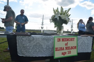 The display was prepared by a group that had traveled from the Tampa area, and was gathered under the death penalty "supporters" banner, a sign that actually bore that word, and is set out there by authorities. Click on the image for larger view. (c FlaglerLive)