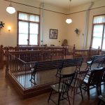 A courtroom on Ellis Island where hearings determining the fate of immigrants were held. (© FlaglerLive)