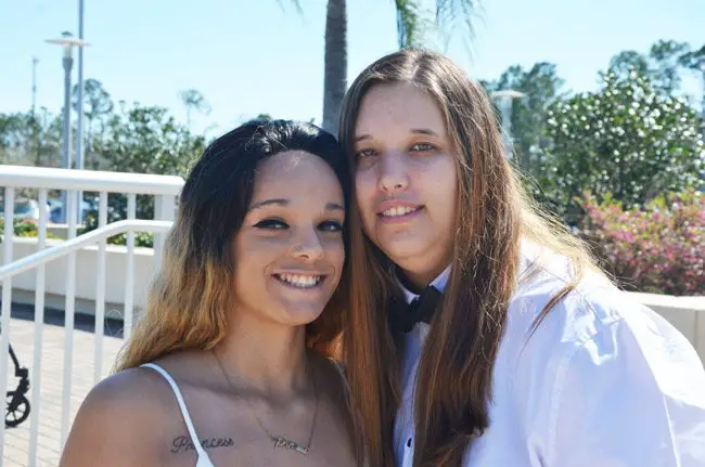 Emily Lamond, 19, and her girlfriend of three years, Taylor Deacon, 21, were among the 16 couples who married or renewed their vows today in the Flagler Clerk of Court';s second annual mass Valentine's Day wedding ceremony in Bunnell. (© FlaglerLive) 