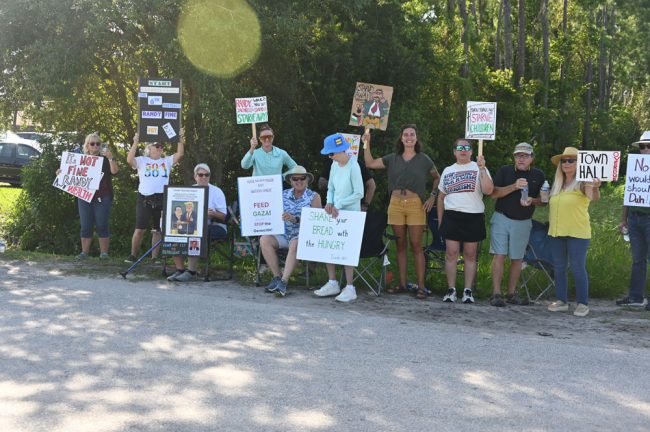 Some of the demonstrators on Utility Drive. (© FlaglerLive)