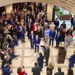 A crowd gathered Friday for a traditional hanky-drop ceremony marking the end of the legislative session. (Tom Urban/NSF)