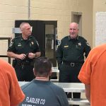 Chief Daniel Engert, left, and Sheriff Rick Staly addressing inmates at the county jail. (FCSO)