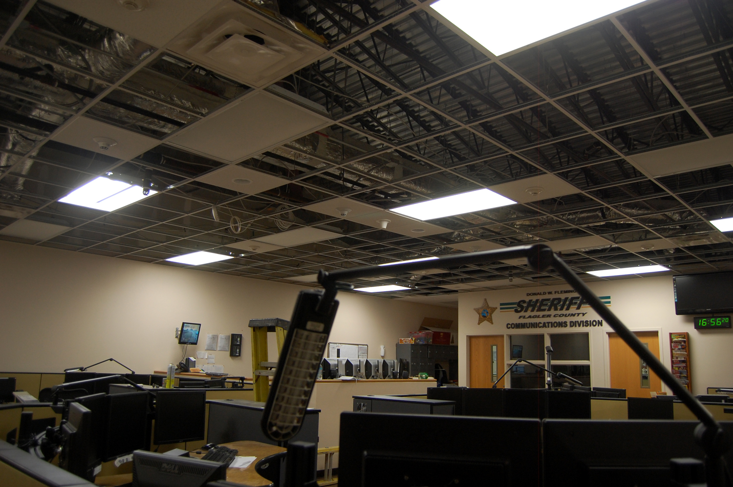 Most of the 911 call center's ceiling tiles were blown out by the downward draft of the fire suppression system. Click on the image for larger view. (© FlaglerLive)