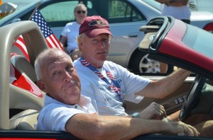 Charlie Ericksen, in the foreground, won his race, Dennis McDonald, in the driver's seat, did not. Click on the image for larger view. (© FlaglerLive)