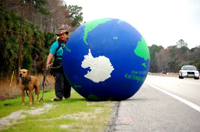 Erik Bendl, the World Guy, and his dog Nice, doing Bunnell. Click on the image for larger view. (© FlaglerLive)
