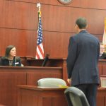 Flagler Palm Coast High School Dean Erin Davis testifying in court in an unrelated case last month. (© FlaglerLive)