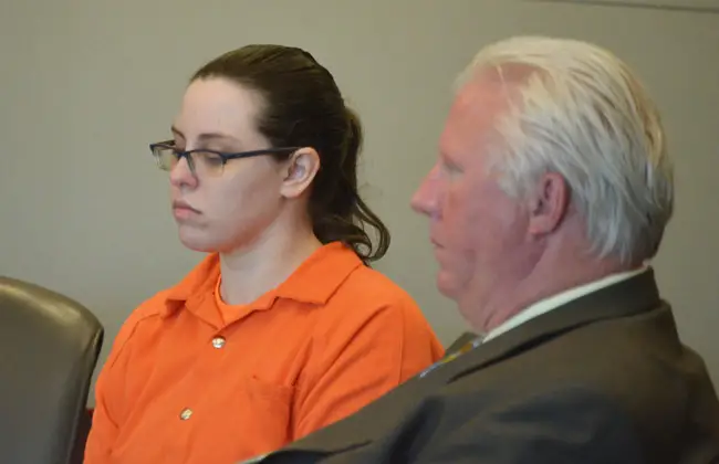 Erin Vickers in court this morning with her attorney, Garry Wood. She goes on tgrial on Sept. 18. (© FlaglerLive)