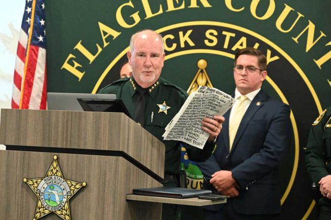 Sheriff Staly shows some of the letters Burns wrote.  (© FlaglerLive)