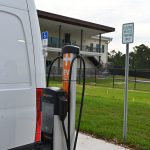 An EV charging station at the Southern Recreation Center, which is in the background. (© FlaglerLive)