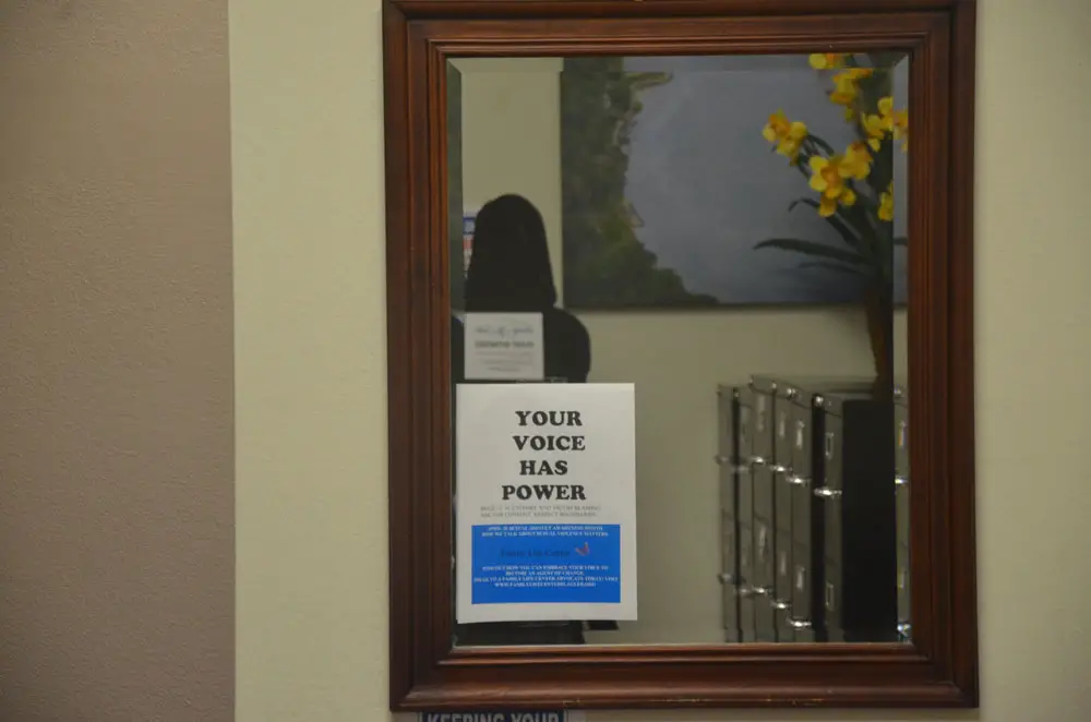 A mirror at the Family Life Center's offices. The center runs the county's only shelter for abused people. (© FlaglerLive)
