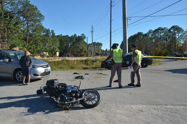 The motorcyclist swerved off U.S. 1, struck a road sign and a culvert, went airborne and crashed by the van, the motorcycle coming to rest a few feet further on. (c FlaglerLive)