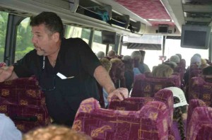 Father Egitto on the bus, on the way to Starke. Click on the image for larger view. (© FlaglerLive)