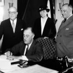 President Franklin D. Roosevelt signed in 1933 the law that led to the National Labor Relations Board’s emergence. AP Photo