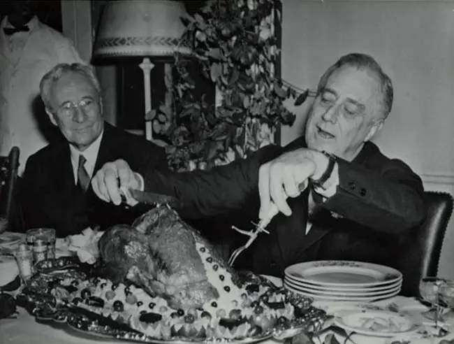 President Franklin D. Roosevelt Carving the Thanksgiving Turkey, November 30, 1933.  (FDR Presidential Library.)