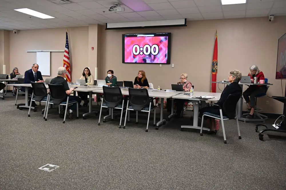 Michael Feldbauer, who heads the Flagler County Drug Court Foundation, addressing the school board on Tuesday. The foundation is making doses of Narcan available to the district at no charge for at least the next two years. (© FlaglerLive)