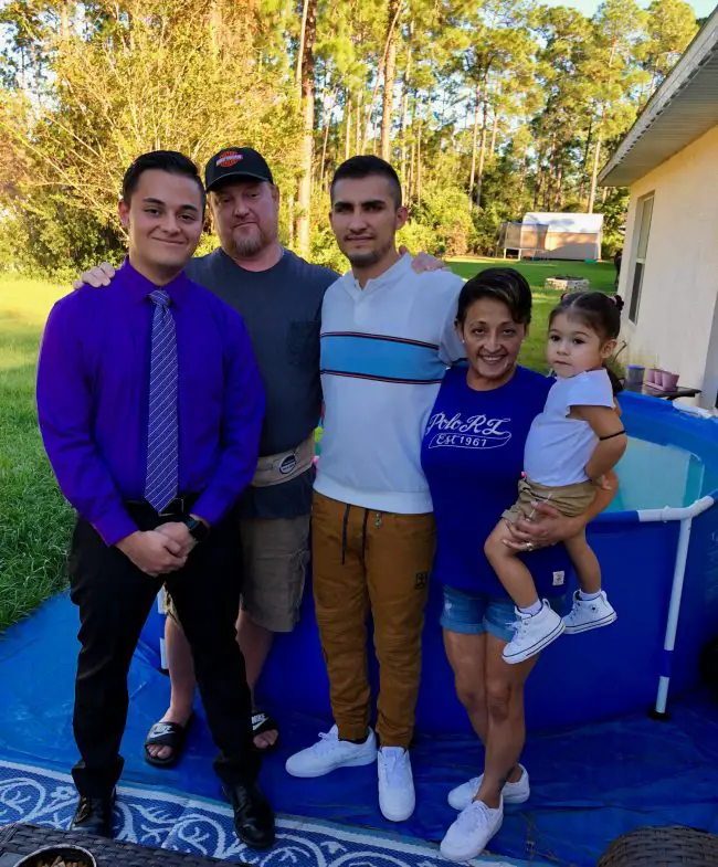 Anthony Fennick, center, with his family in Palm Coast: his brother and father, both of whom are called Dan, his mother Ericka Williams, and his daughter Eva. (Williams family)