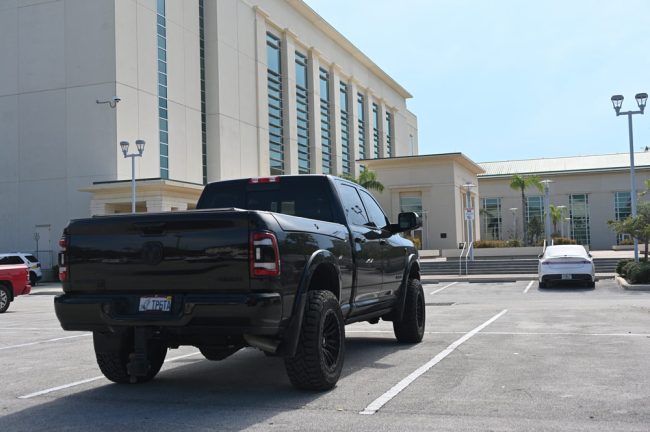 For two days, Joao Fernandes parked his truck--the truck involved in the hit-and-run--directly in front of the courthouse, where members of the jury and the victim would walk by again and again. Fernandes did not drive his truck home this evening, but would have glimpsed it as he was led into a sheriff's patrol vehicle and to the county jail. (© FlaglerLive)