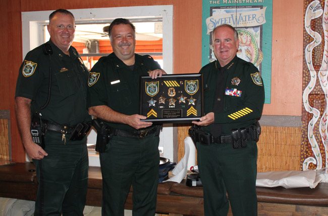 Commander Sam Ferris retires today after 21 years of service at the Flagler County Sheriff’s Office. A retirement luncheon was held at Highjackers Restaurant at the Flagler County Airport on Monday afternoon. Executives, command staff, co-workers and friends came to wish Commander Ferris well in his retirement and reminisce over memories made over the last twenty-one years. 