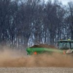 Fertilizer scarcity and costs are just the beginning of the problems. Jim Watson/AFP via Getty Images