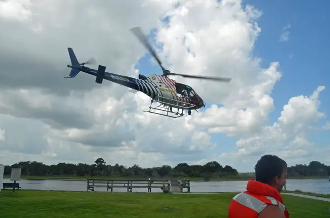 Flagler County Fire Flight, the county's emergency helicopter, will be in training with the county's marine unit Thursday. (© FlaglerLive)