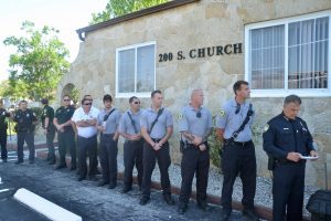 Firefighters and cops, including Fire Chief Don Petito and Bunnell Police Chief Tom Foster. Click on the image for larger view. (© FlaglerLive)