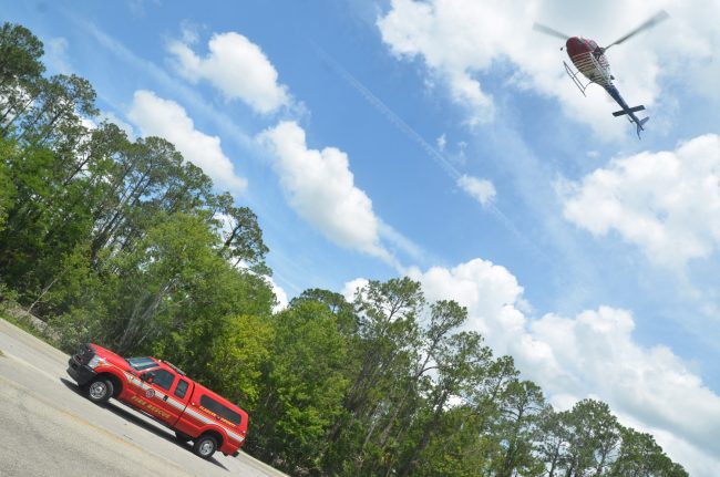 Flagler County FireFlight, the emergency helicopter, was briefly at the scene but did not transport the crash victim. (c FlaglerLive)