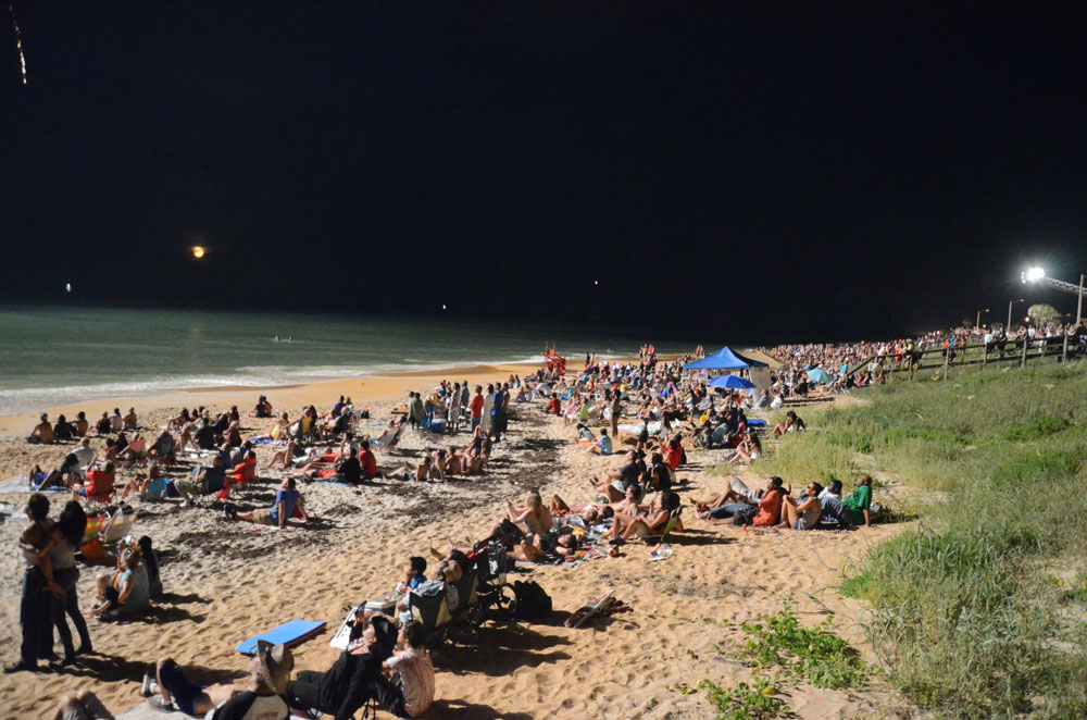 The beach may be disappearing, the Flagler Beach pier will definitely be disappearing for three years, but the fireworks will not. (© FlaglerLive)