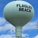 Flagler Beach was in repair mode all the way to its water tower today. (© Rick Belhumeur for FlaglerLive)